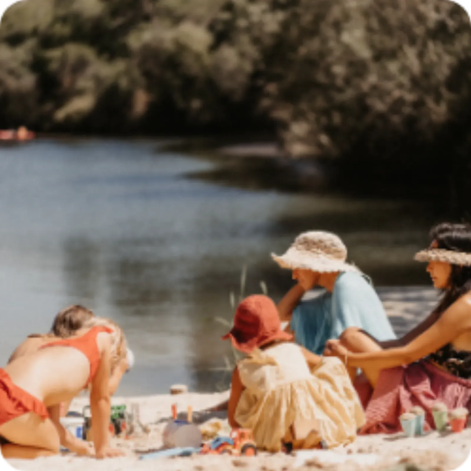 Families playing by the lake